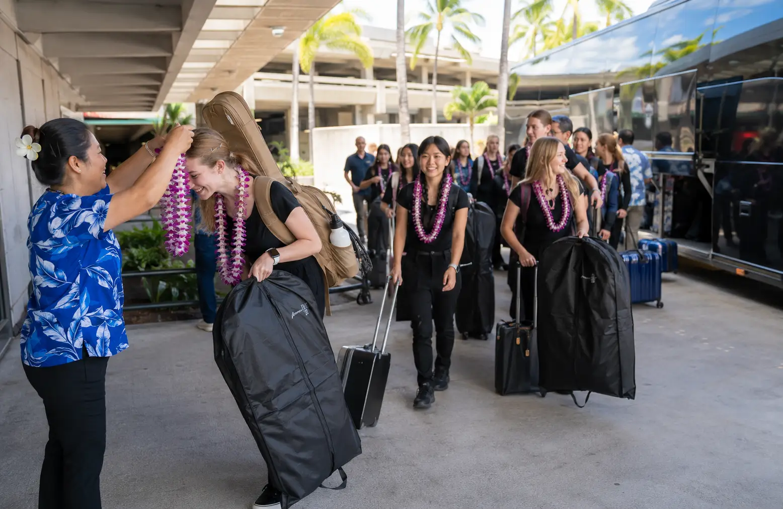 Performing arts group arriving at a Hawaii airport